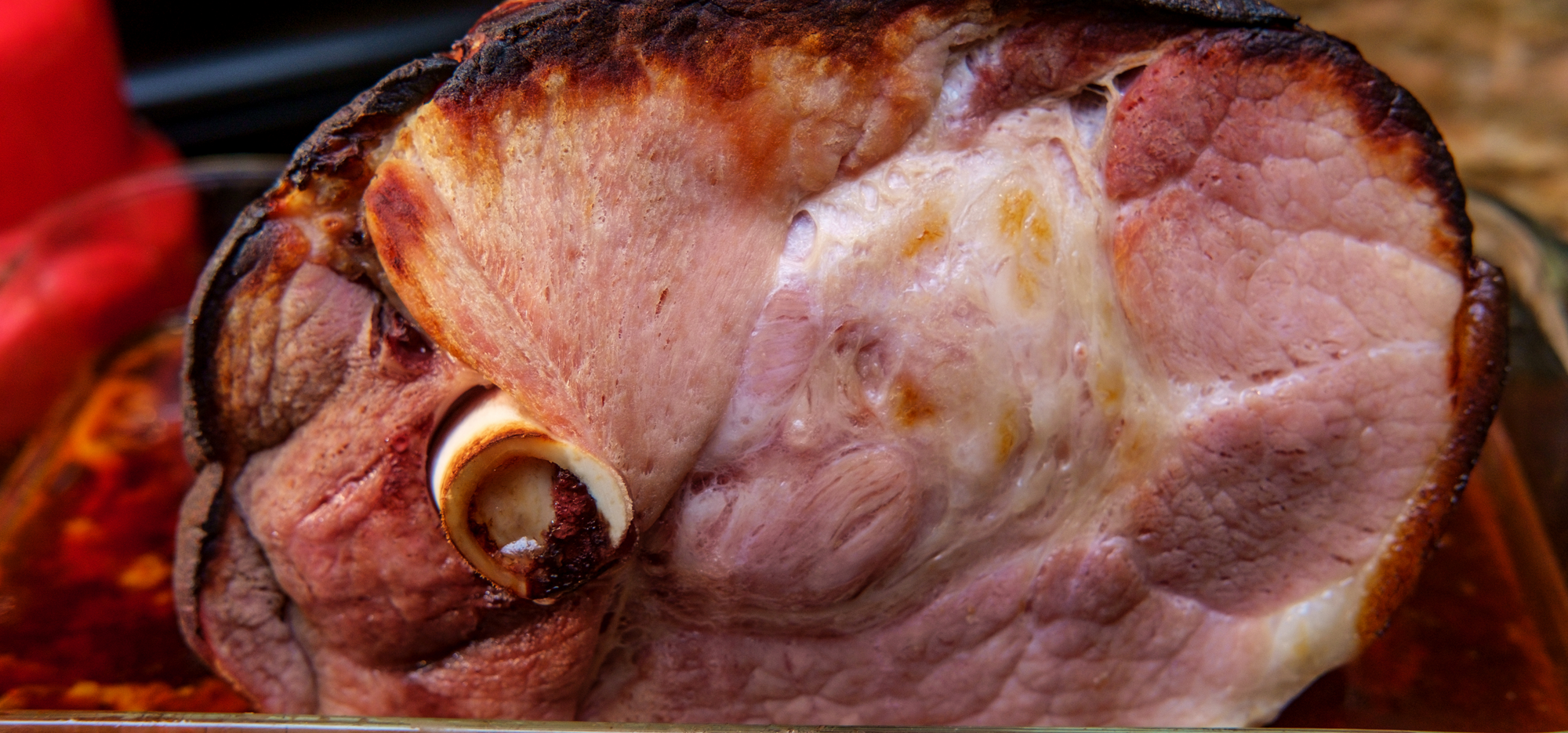 Maple-sugar glazed ham on the bone