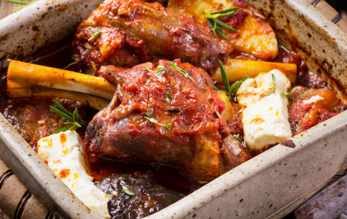 Jarret d'agneau braisé aux tomates et son vin de muscat